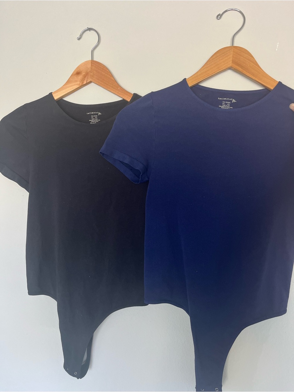 Set of Two Free People Bodysuits in Black and Navy - Size M/L